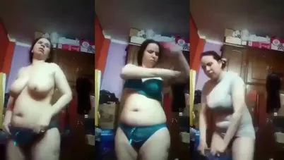 ملبن فلاحة بتغير هدومها كاملة وتصور بزازها لعشيقها